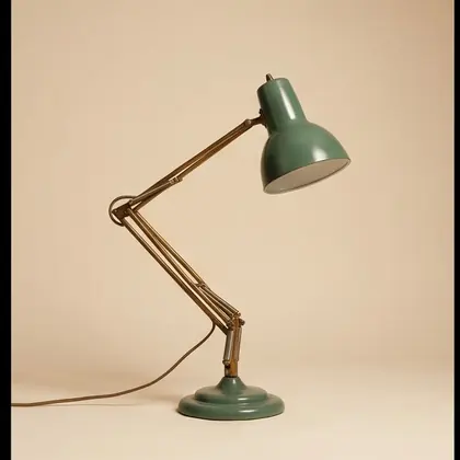 Brass and sage enamel articulated desk lamp, rotated 0 degrees.