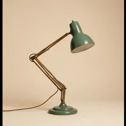 Brass and sage enamel articulated desk lamp, rotated 45 degrees.