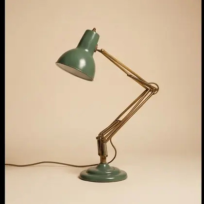 Brass and sage enamel articulated desk lamp, rotated 180 degrees.